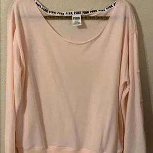 PINK sweatshirt.